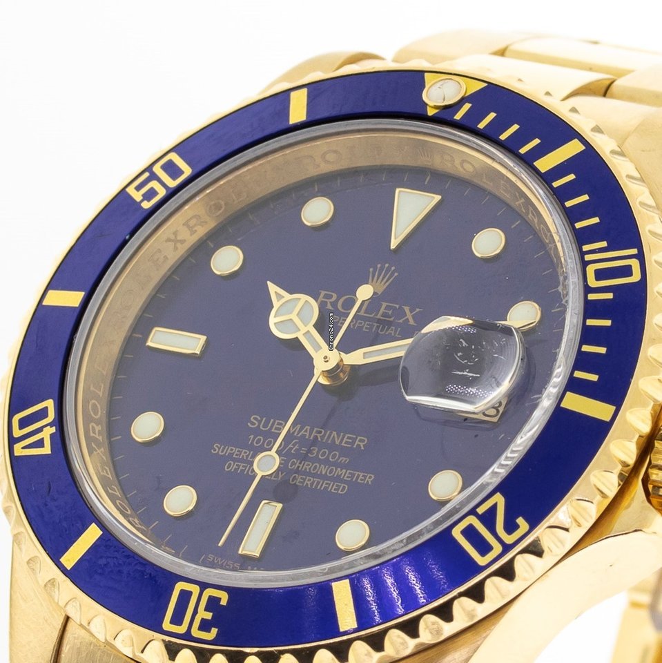 Réplique de qualité Rolex Submariner Date 40mm cadran bleu or jaune et lunette bleue 16618